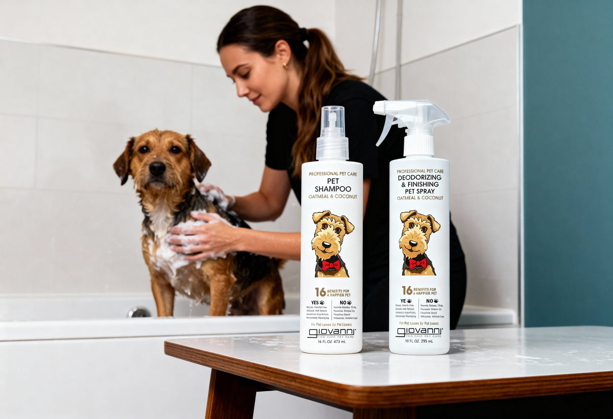 Woman bathing a medium-sized dog in a bathroom using Giovanni’s Oatmeal & Coconut Pet Shampoo, with Giovanni Pet Shampoo and Deodorizing & Finishing Spray bottles displayed in the foreground.