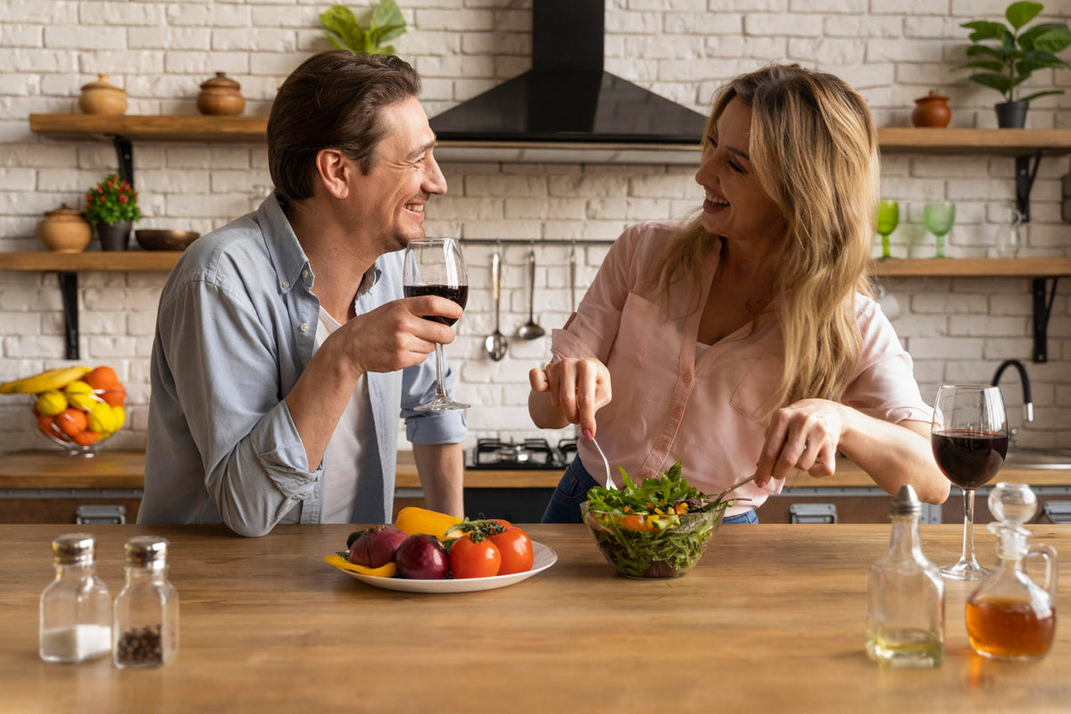 Australian couple preparing a nutrient-dense breakfast at home, representing everyday metabolic health and balance.