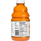 The Ginger People Turmeric Juice 946ml bottle showcasing nutritional facts and vibrant orange color.