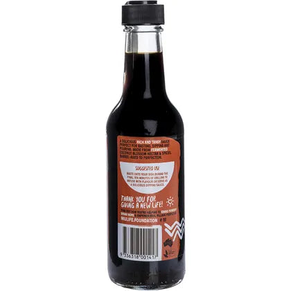 Niulife Organic Coconut Amino Sauce Barbeque 250ml bottle with colorful label and nutrition information.