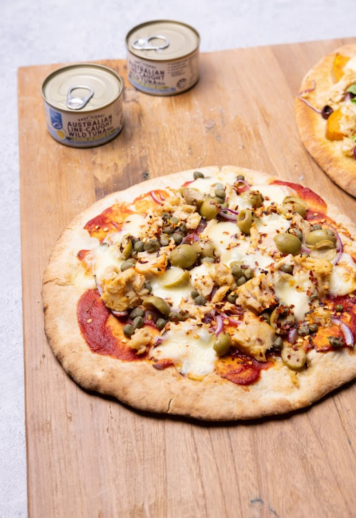 East Coast Tuna Co serving suggestion: tuna pizza with olives and capers; other ingredients not included
